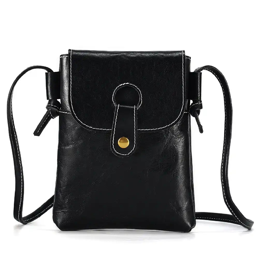 Black women's leather crossbody bag, with long handle and elegant clasp - front view.