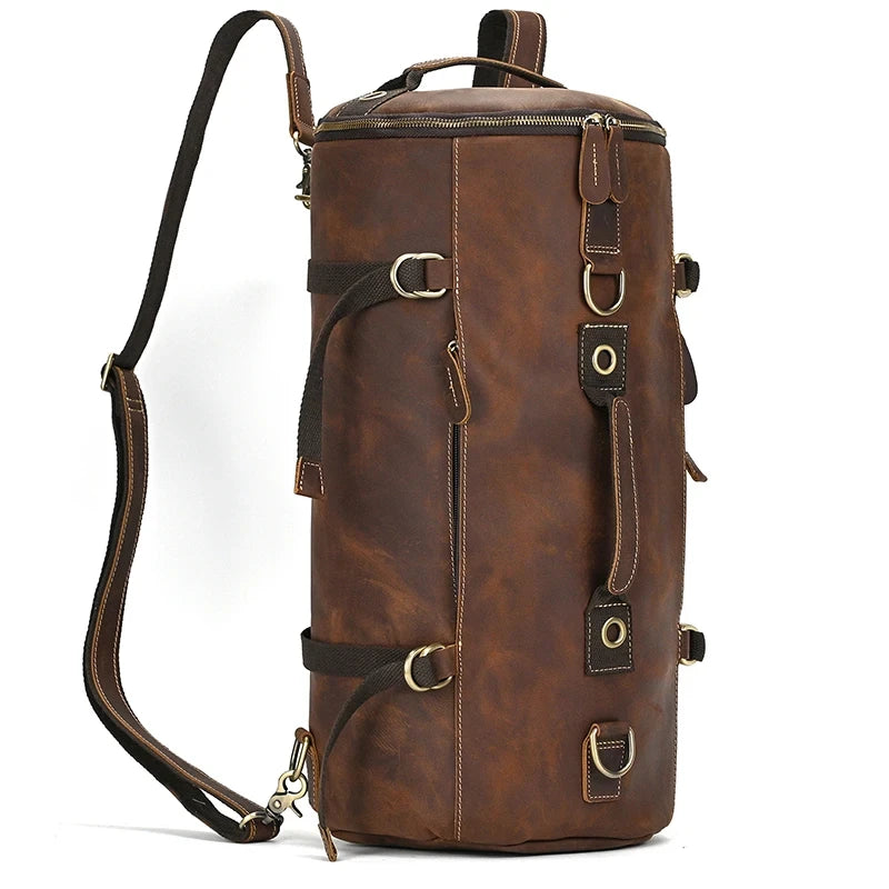 Durable and stylish brown leather duffle bag, with adjustable straps and several compartments for organization, front view.