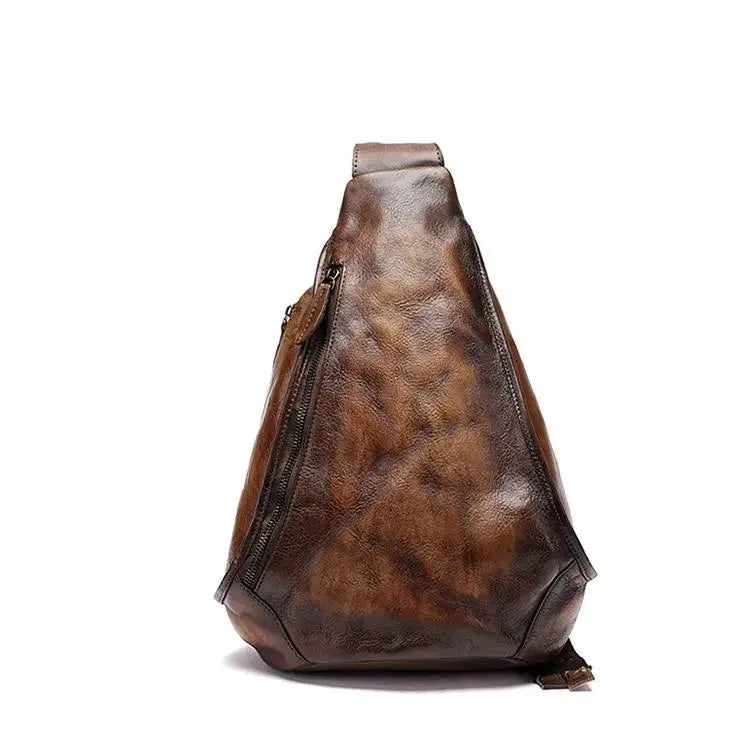 Vintage brown shoulder bag with a unique triangular design - front view.