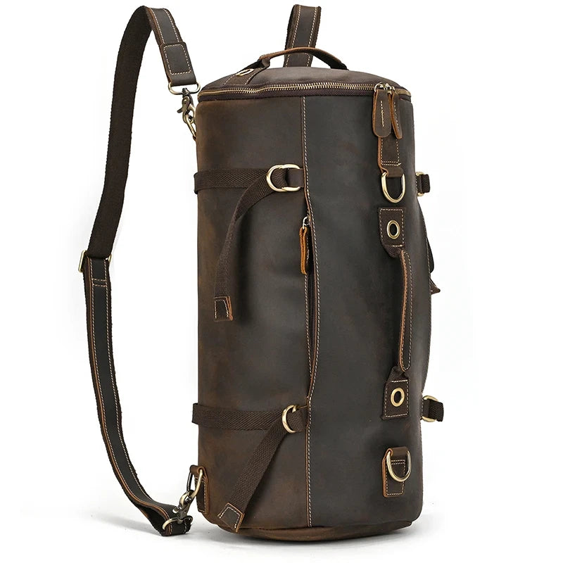 Durable and stylish dark brown leather duffle bag, with adjustable straps and several compartments for organization, front view.
