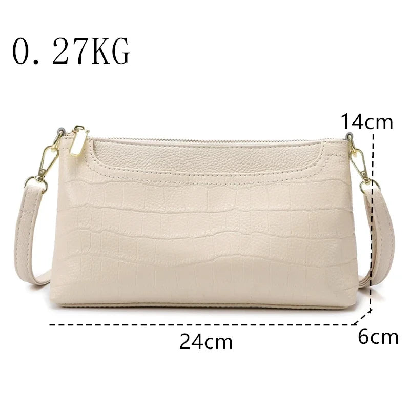 Women's leather bag with an elegant design, measuring 24cm x 14cm x 6cm.