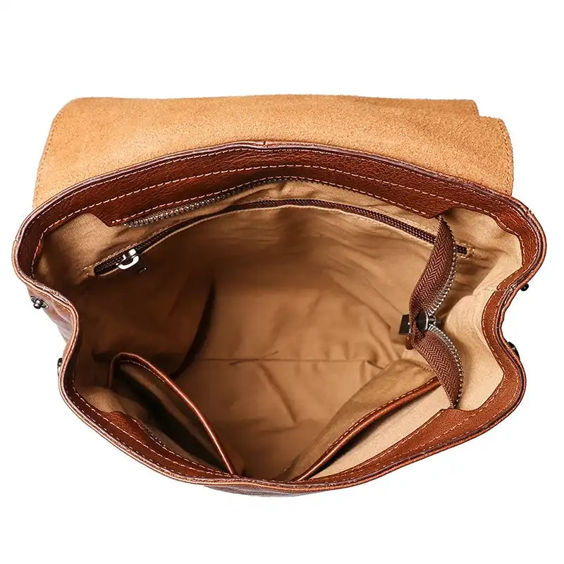 interior view of a stylish brown handbag showcasing its spacious design with compartments and pockets.