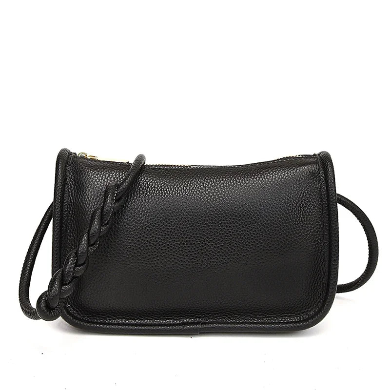 Stylish black leather crossbody bag with braided strap - front view.
