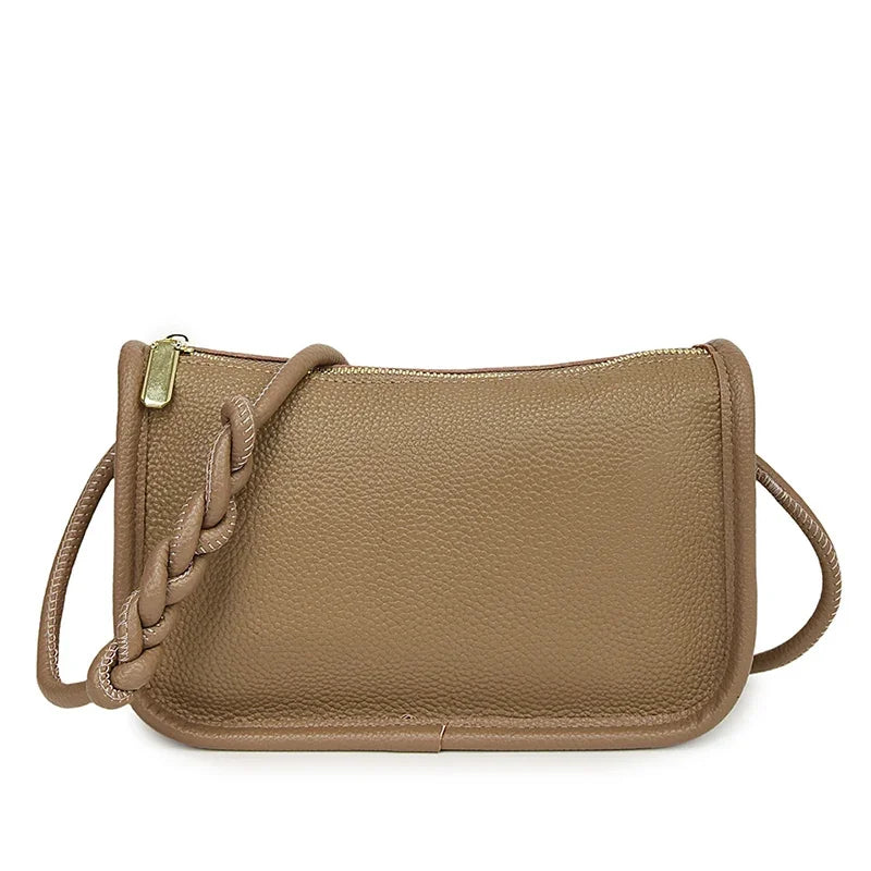 Stylish khaki leather crossbody bag with braided strap - front view.