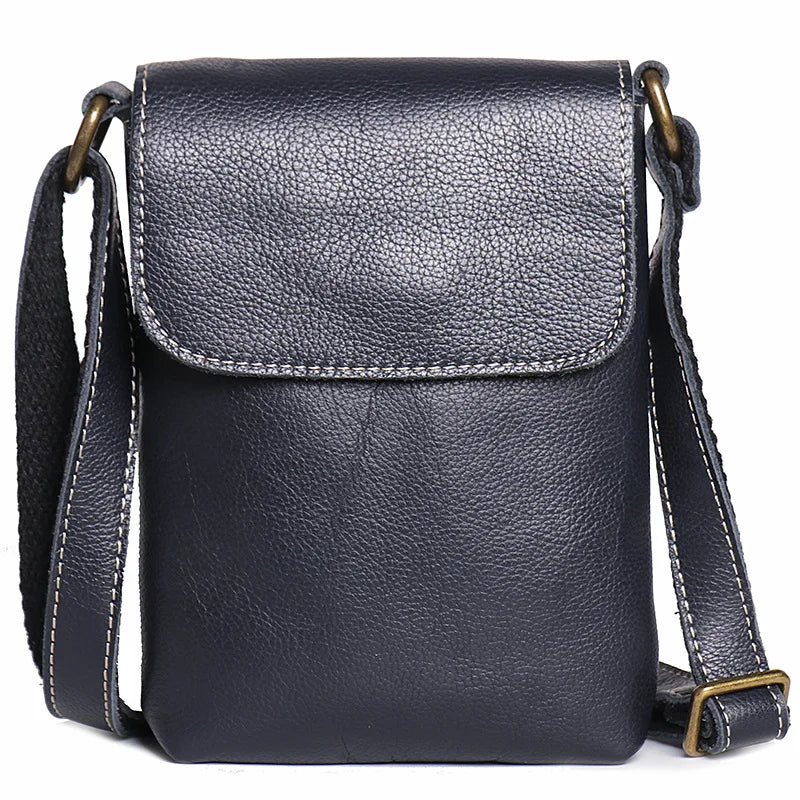 Vintage blue leather mini shoulder bag with adjustable strap - front view
