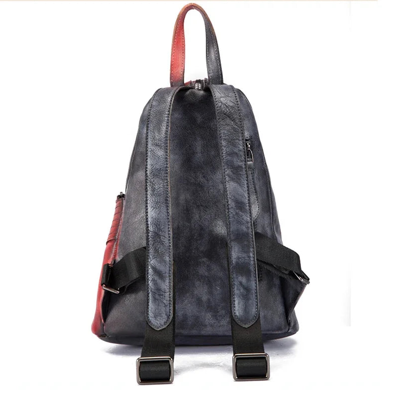 back view of a black and red leather backpack featuring a sleek design and straps.