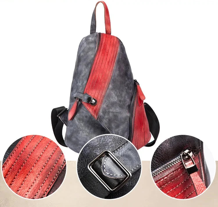 Close-up view of the red and black backpack showcasing the zipper, stitching details and buckle.