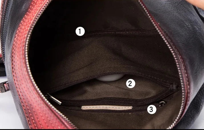 Stylish leather bag interior with zippered pockets and spacious design.