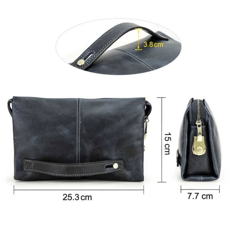 Blue leather clutch measuring 25.3 cm wide, 15 cm high and 7.7 cm deep. 
