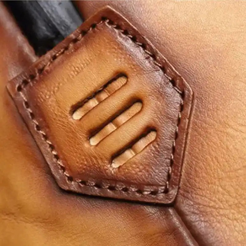 Detail view of the leather material of a brown bag.