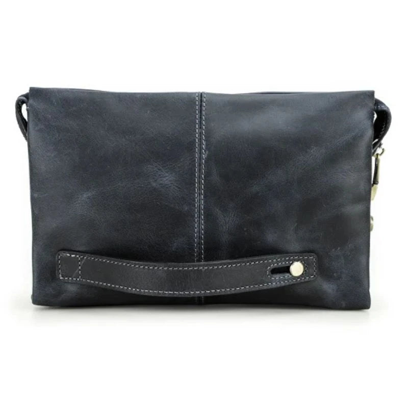 Blue clutch bag in durable leather with a zipper and handle, front view