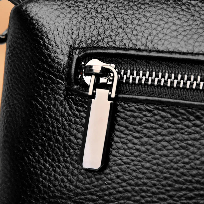 Chic Genuine Leather Shoulder Bag - Close-up of a zipper on a black leather bag