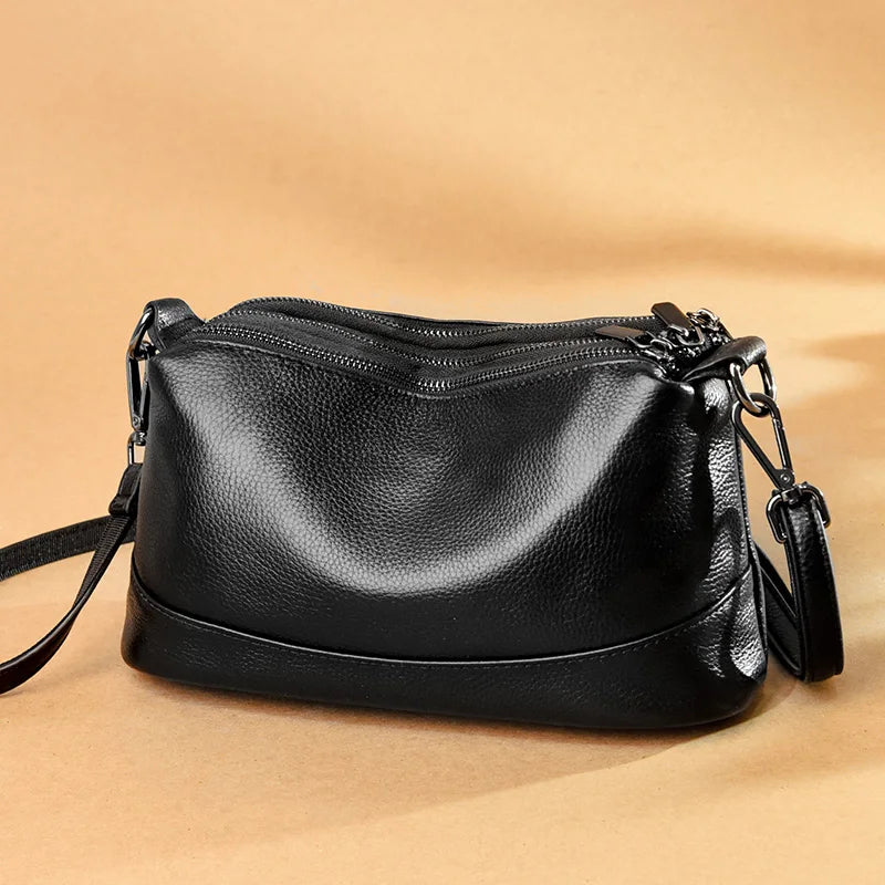 Chic Genuine Leather Shoulder Bag with three zipped compartments 