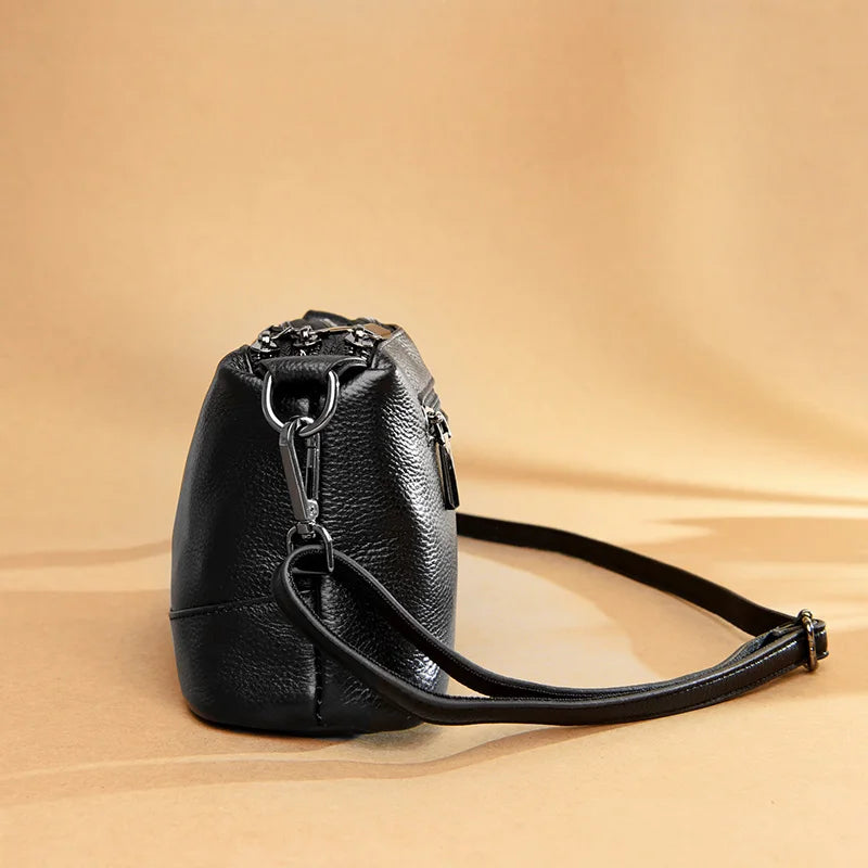 Chic Genuine Leather Shoulder Bag with a shoulder strap and metal hardware - side view