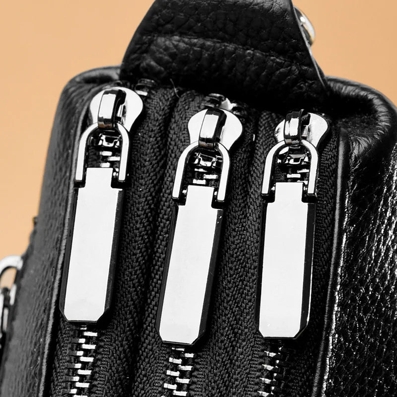 Chic Genuine Leather Shoulder Bag - Modern black leather bag with 3 elegant zipper accents