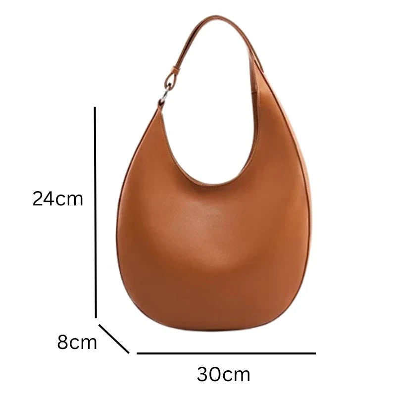 elegant brown moon-shaped leather bag, measuring 30cm wide, 24cm high, 8cm deep, front view.