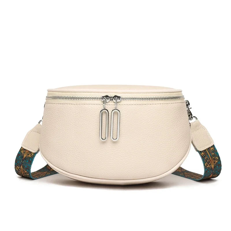 white leather shoulder bag with colored patterned strap - front view.