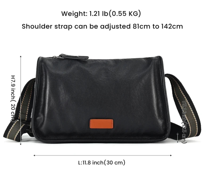 Stylish black leather crossbody bag with adjustable shoulder strap and dimensions.