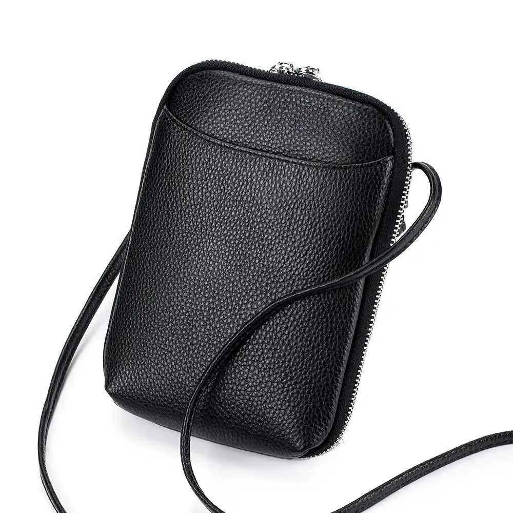 Stylish black leather crossbody bag with a sleek design and leather strap - front view.