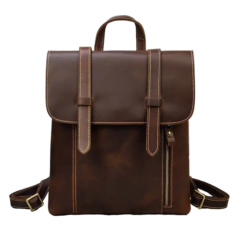 Brown leather backpack on a white background, front view