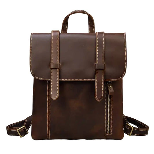 Brown leather backpack on a white background, front view