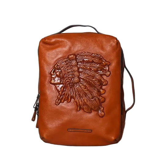 Brown leather backpack with embossed design on a white background, front view.