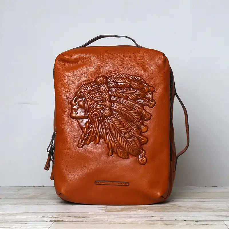 Brown leather backpack with indigenous chief embossed print. An attractive accessory for all occasions - front view.