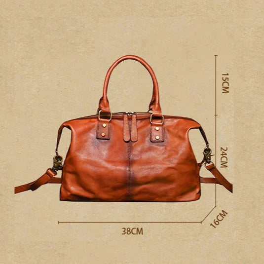 Brown leather bag, elegant vintage style, with handles and measures 38cm wide, 15cm high, ideal for daily use or travel.