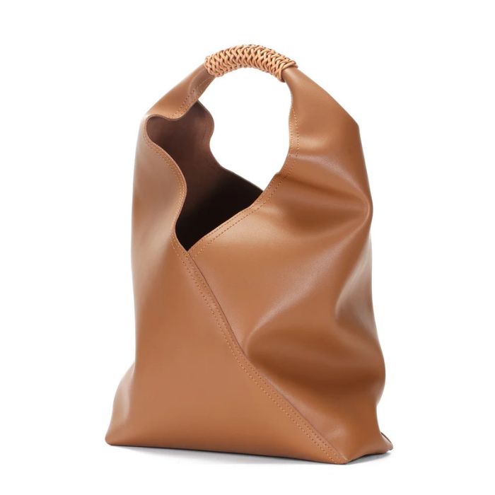 Brown color leather bag with unique design and braided handle, front view.