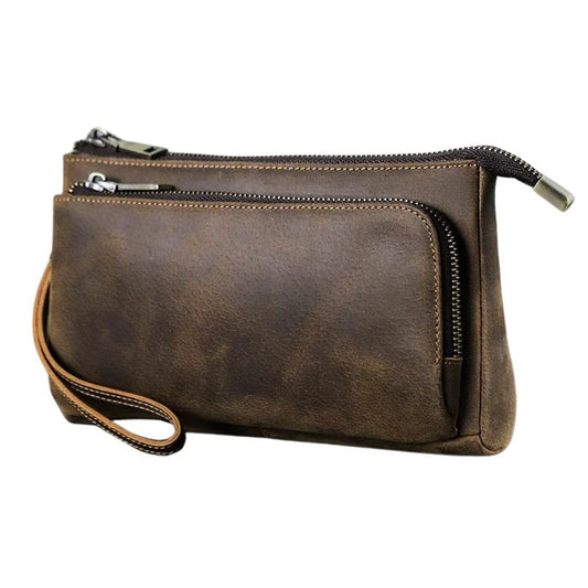 Brown leather clutch with zippers, showing an elegant and functional design, front view - variant.