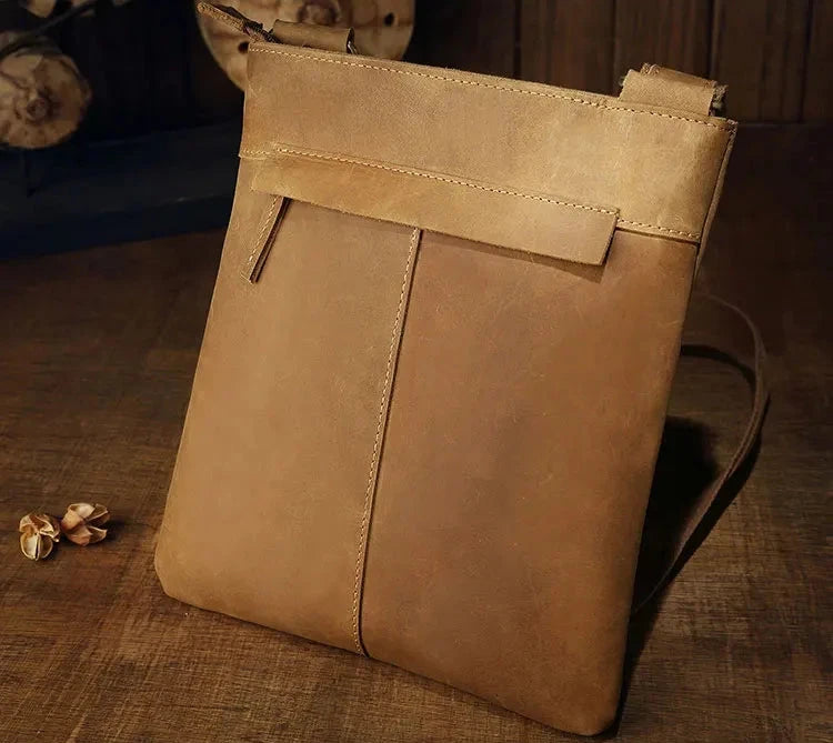 Brown leather crossbody bag with an elegant design, ideal for everyday use and special occasions - back view.
