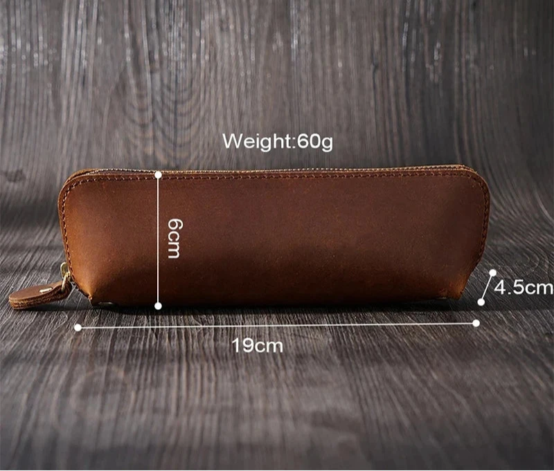 Brown leather pencil case measuring 19cm x 6cm x 4.5cm, front view.