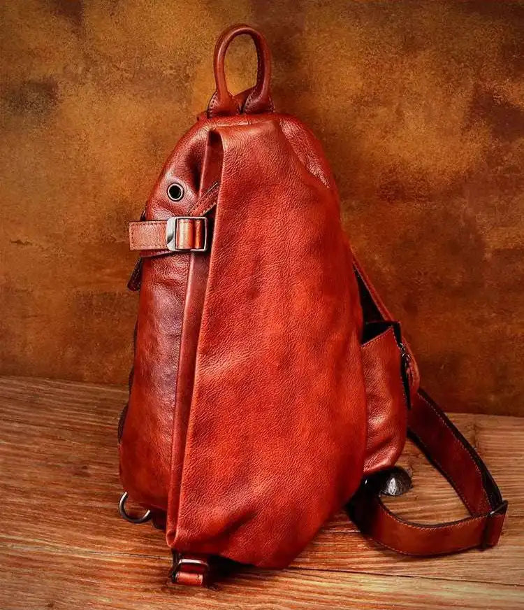 Side view of a stylish brown leather shoulder bag