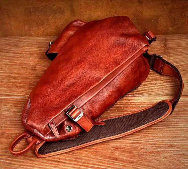 elegant brown leather shoulder bag with adjustable strap - back view.