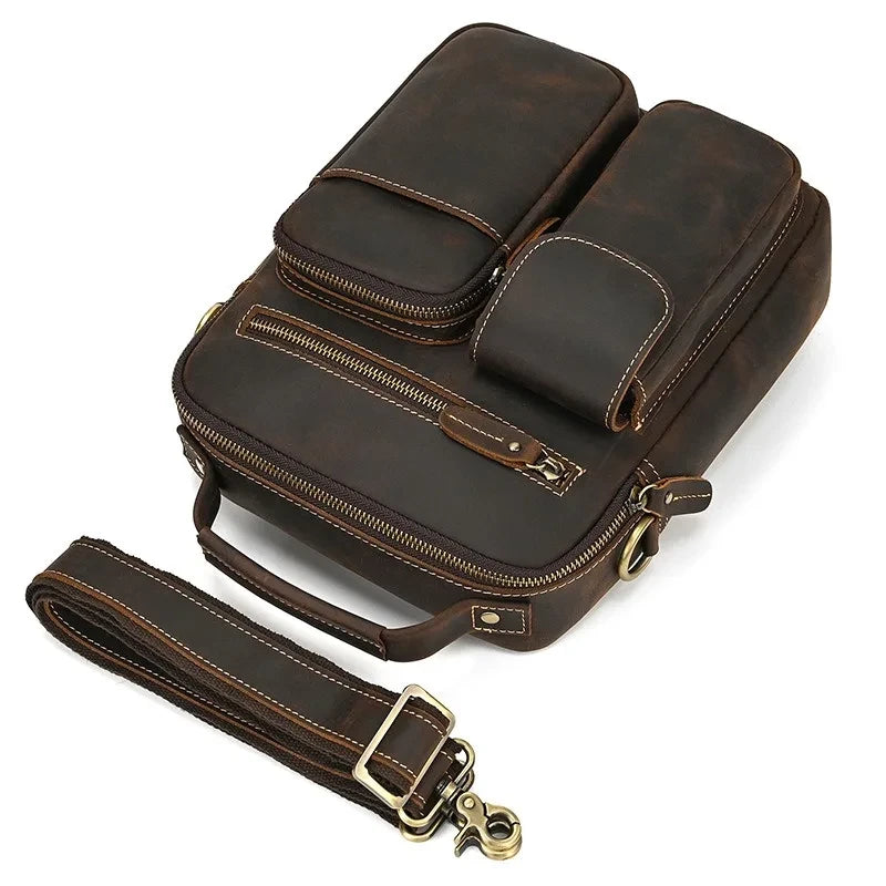 Stylish vintage leather crossbody bag with multiple pockets and a detachable strap -top view.