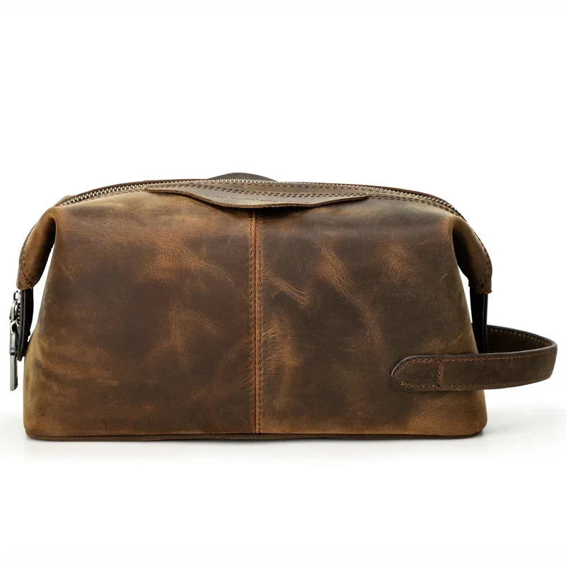 Brown leather toiletry bag with zipper closure, ideal for storing personal items, back view.