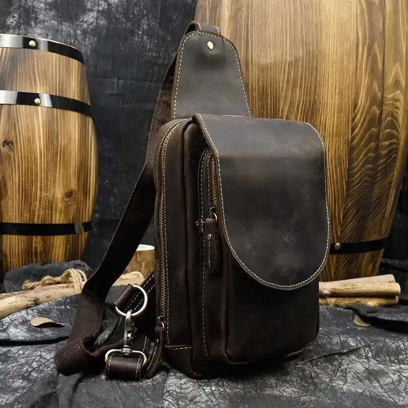 Coffee brown leather bag, ideal for daily use and casual style, featuring a modern and practical design, front view.
