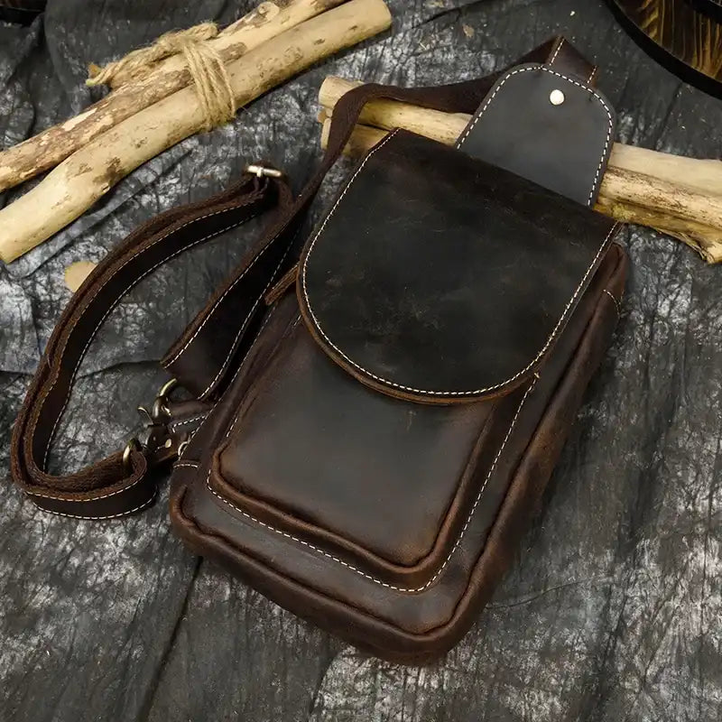 Coffee brown leather men's bag with an elegant and practical design and front pocket.