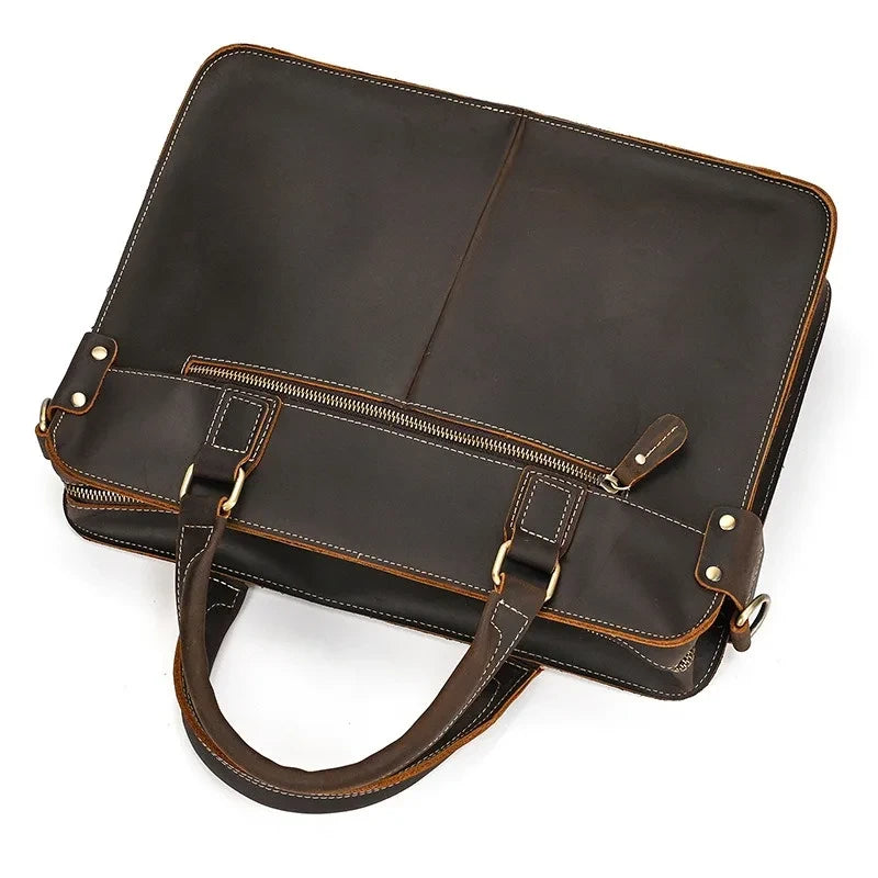 brown leather suitcase with handles and zipper, ideal for work and travel, offering style and functionality.