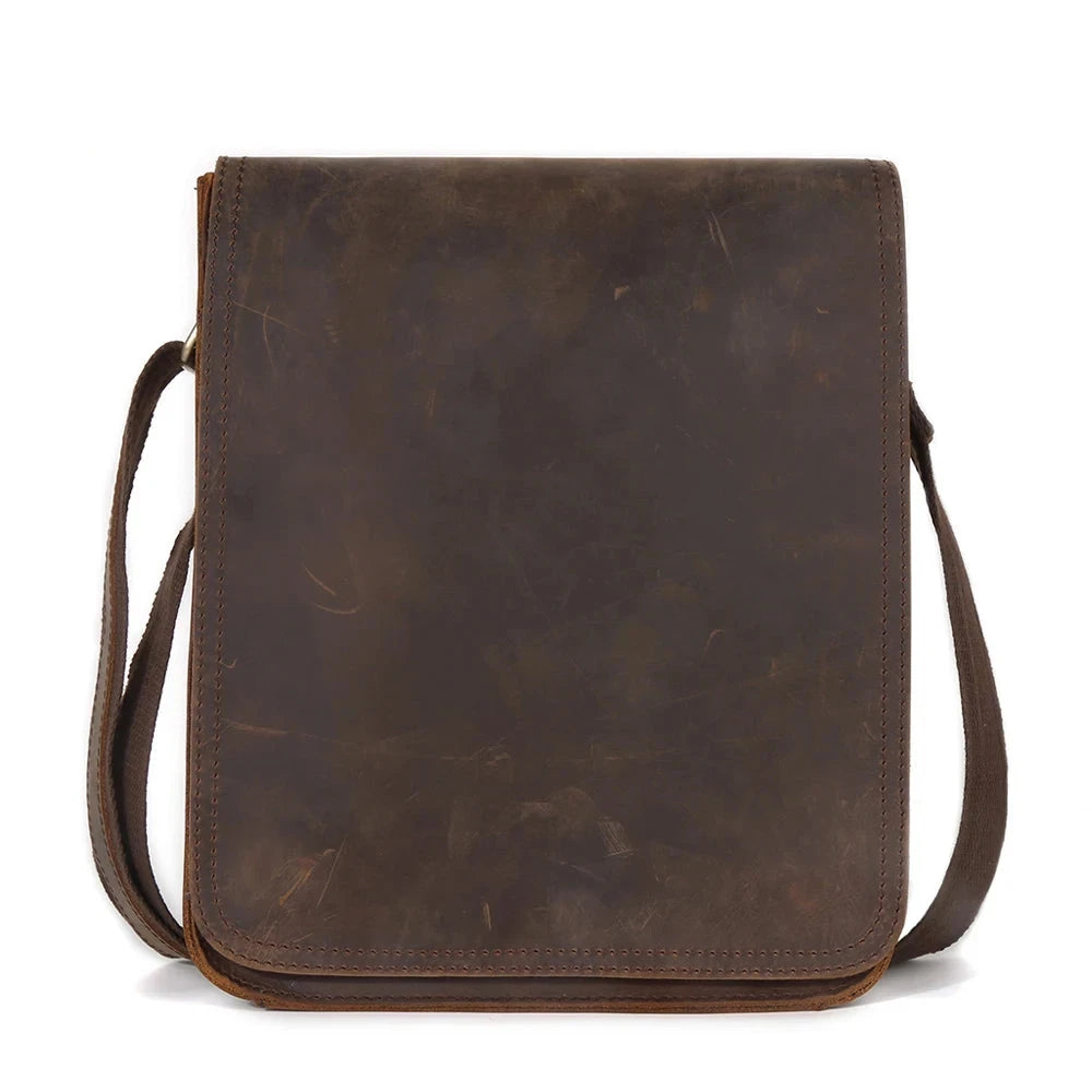 Coffee brown leather crossbody bag, casual style with minimalistic design, front view variant.