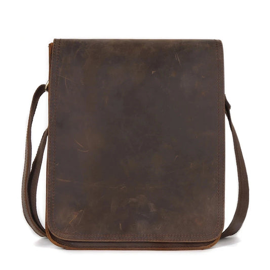 Coffee brown leather crossbody bag, casual style with minimalistic design, front view variant.