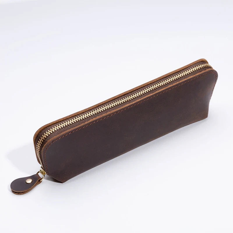 A durable coffee brown leather pen case featuring a smooth zipper, front view.