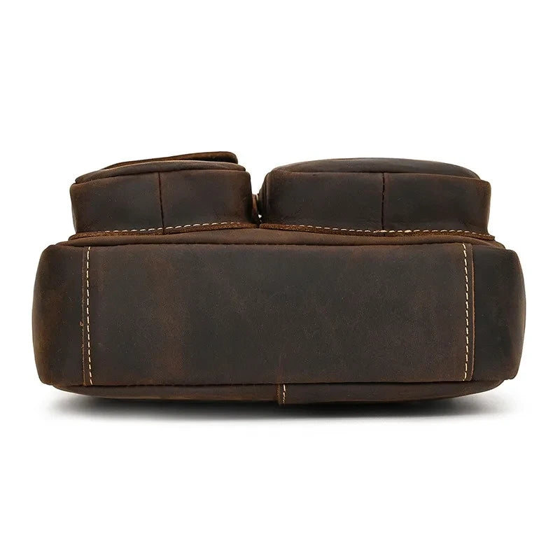 bottom view of a brown vintage leather bag showcasing its craftsmanship and design.
