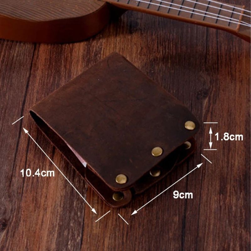 Brown leather wallet with metal details, measuring 10.4cm x 9cm x 1.8cm.