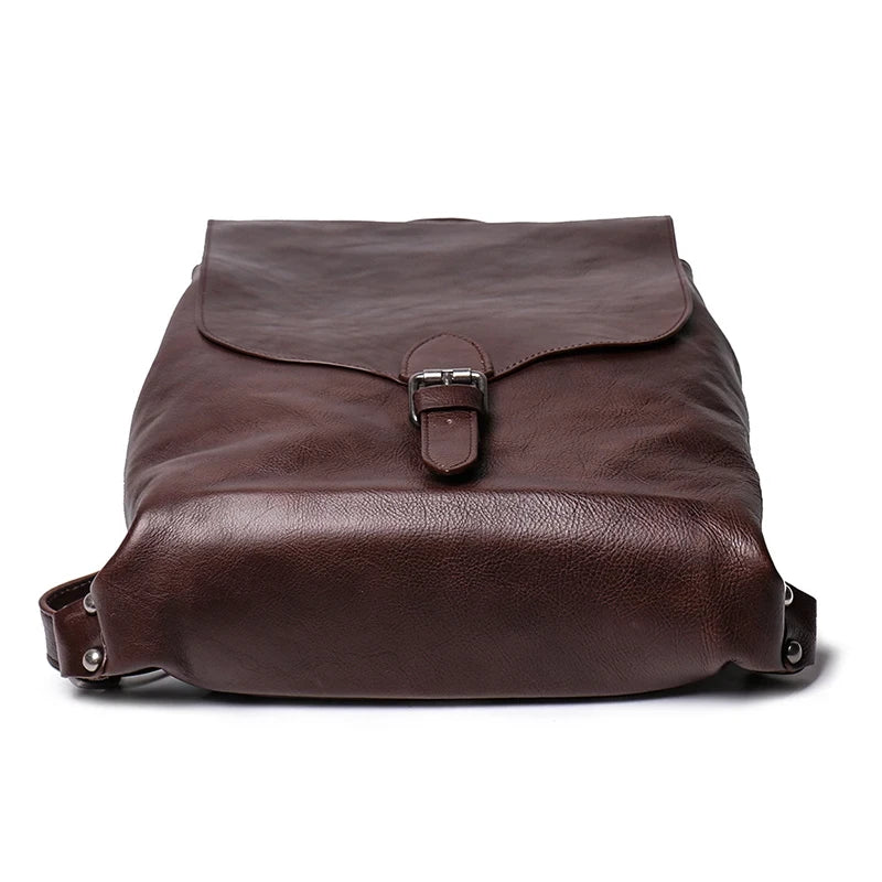 Vintage-inspired coffee brown leather bag with a sleek design with a buckle closure.
