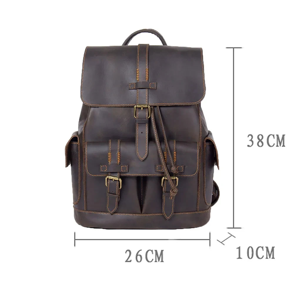 Brown leather backpack, measuring 38cm high, 26cm wide and 10cm deep. Ideal for daily use and travel, combining style and functionality.