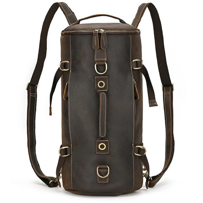 Dark brown leather duffle bag featuring adjustable straps and spacious compartments, front view.