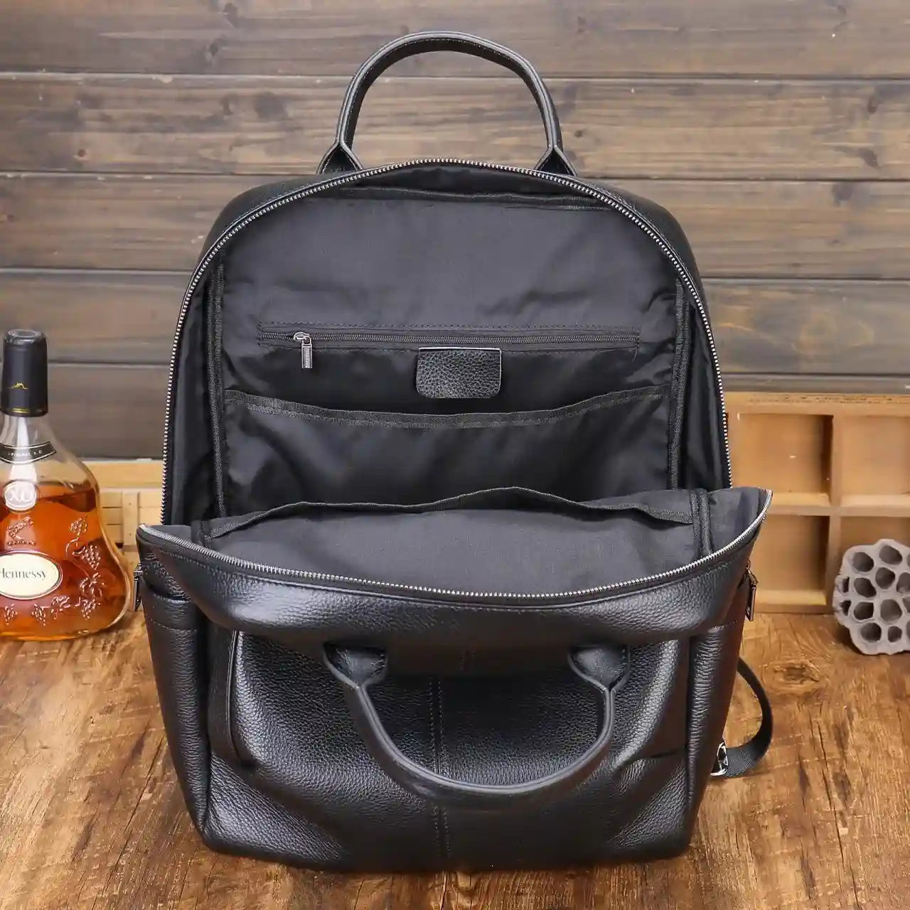 Interior view of a spacious black backpack with organized pockets.