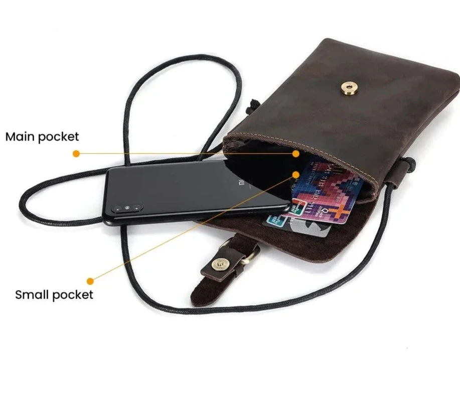 open stylish leather crossbody bag with main and small pockets for phone and cards.