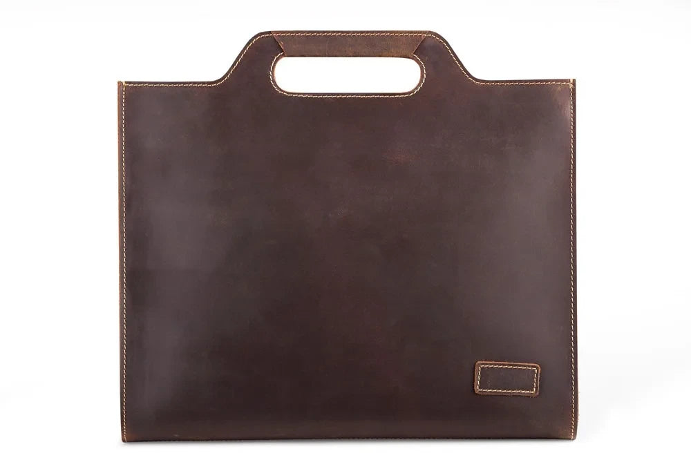 Brown leather briefcase with handle and minimalist and elegant style, front view.